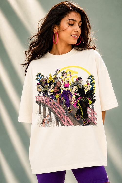 Woman wearing Mild Popie's March of Yokai premium oversized graphic T-shirt featuring original Japanese Yokai-inspired artwork, inspired by Japan's Night Parade of One Hundred Yokai.