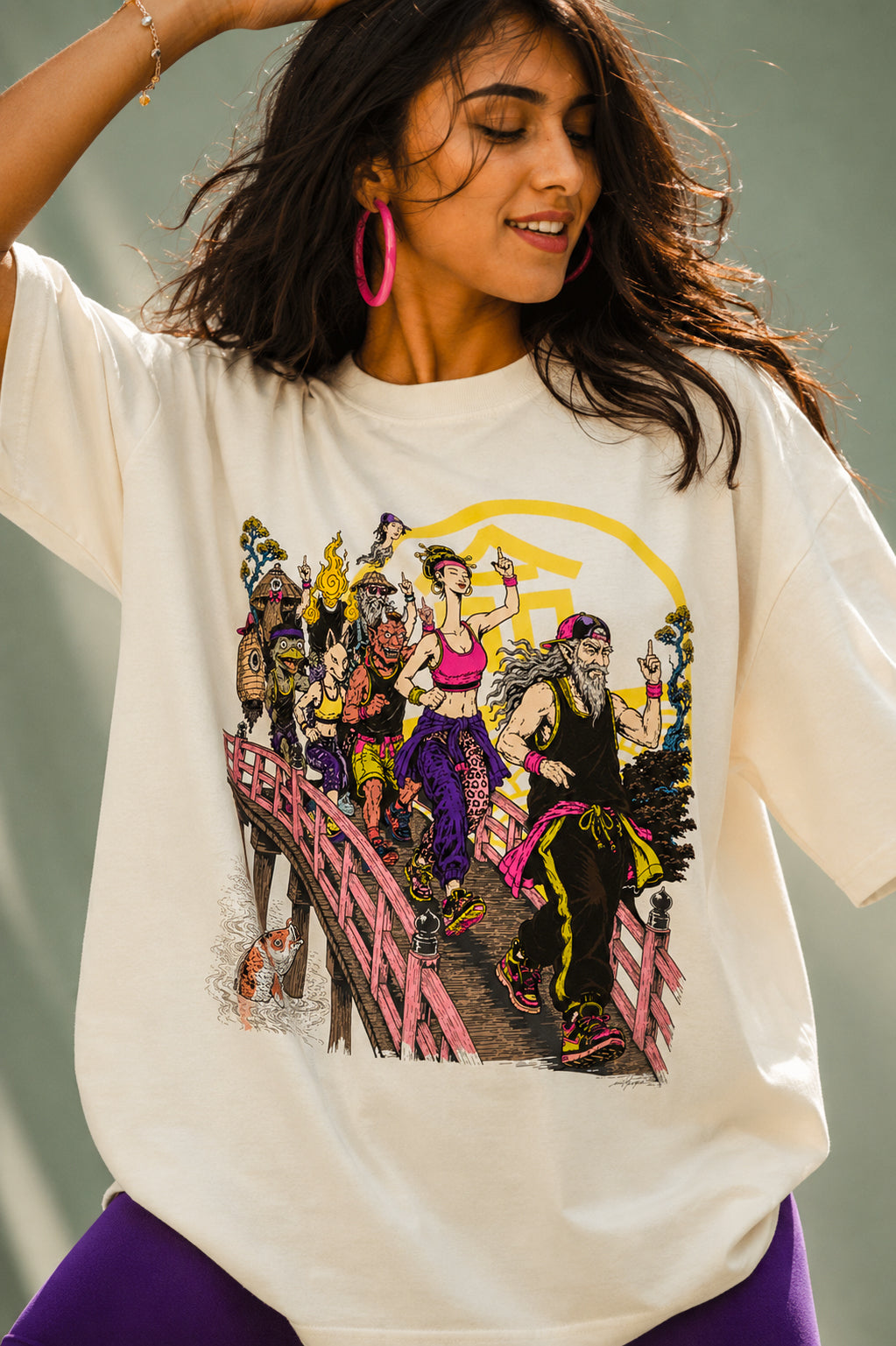 Close-up of a woman wearing Mild Popie's March of Yokai premium oversized graphic T-shirt featuring original Japanese Yokai-inspired artwork.