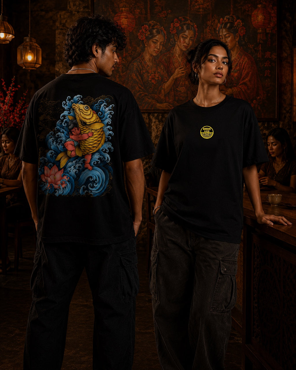 Male and female models wearing Kintaro & Koi oversized t-shirt in black with large back artwork inspired by Japanese mythology – Mild Popie