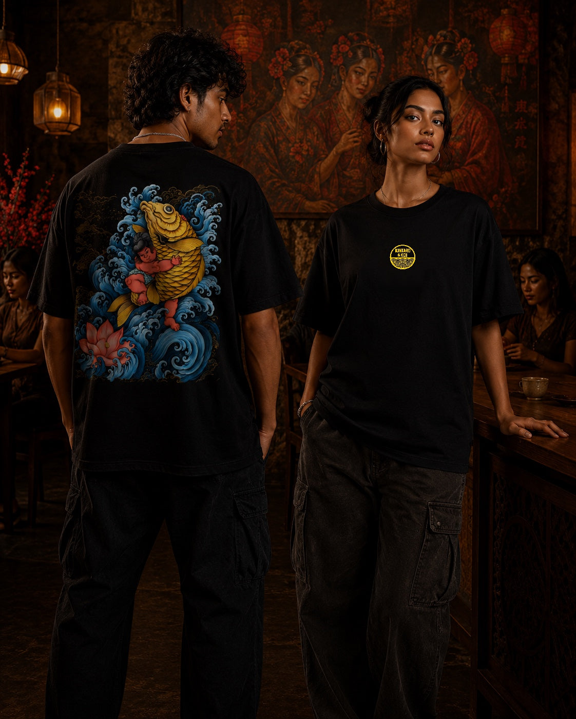 Male and female models wearing Kintaro & Koi oversized t-shirt in black with large back artwork inspired by Japanese mythology – Mild Popie