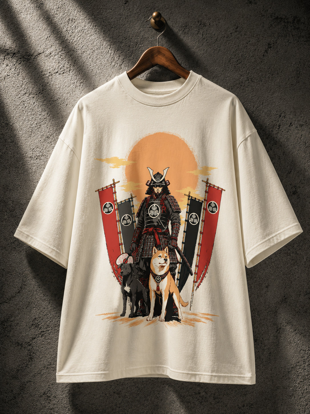 Dog Shogun oversized off-white t-shirt hanging on a wooden hanger, featuring a samurai warrior and loyal dog inspired by Tokugawa Tsunayoshi and Japanese folklore.