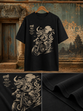 Close-up of Yali rider artwork with motorcycle and temple-inspired elements on regular fit t-shirt in black – Mild Popie